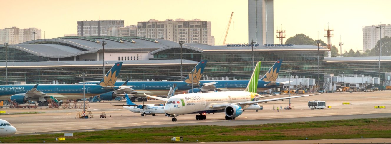 Aircraft lineup outside a modern terminal-our top airline disruption management software list.
